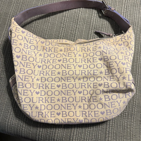 Dooney & Bourke Handbags - Dooney and Bourke Hobo style purse. Cream w/light purple